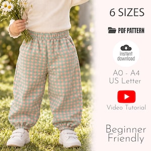 May include: Pants with a light green and pink checkered pattern, featuring an elastic waistband and elastic cuffs. The image includes text: 6 SIZES, PDF PATTERN, instant download, A0 - A4 US Letter, Video Tutorial, and Beginner Friendly.