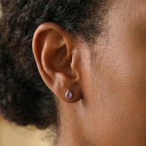 May include: A rustic wooden sign with the text "Welcome to our home" in a handwritten style. The sign features a distressed finish and a simple, inviting design, perfect for a front porch or entryway.