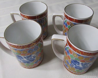Lof of 4 Imari mugs signed