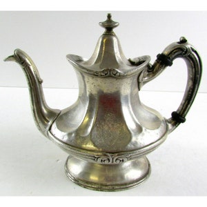 Vintage Reed & Barton silver soldered teapot engraved with family coat of arms