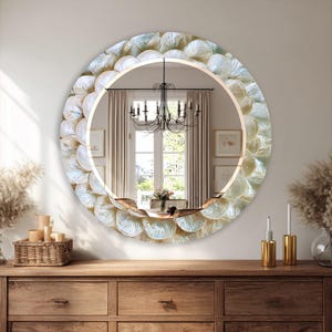 Modern wide glass mirror with elegant shell texture effect for living room or entryway styling