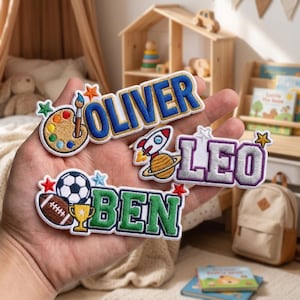 May include: Embroidered patches with names "OLIVER", "LEO", and "BEN" in various colors and fonts. The patches feature designs like a rocket, a soccer ball, a football, and a paint palette. These patches are ideal for personalizing clothing or accessories.