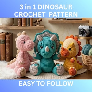 May include: Three crocheted dinosaur toys in pink, teal, and yellow. The toys are sitting on a white surface. The text "3 in 1 DINOSAUR CROCHET PATTERN" and "EASY TO FOLLOW" are displayed above and below the toys.
