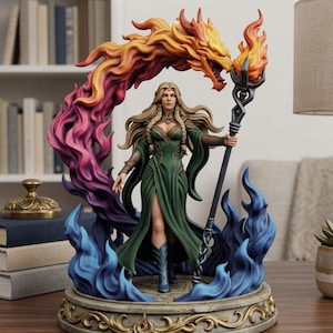 May include: A detailed figurine of a long-haired figure in a green dress holding a staff topped with a flaming dragon head. The figure is surrounded by swirling orange, yellow, and purple flames above and blue flames below on a circular base.