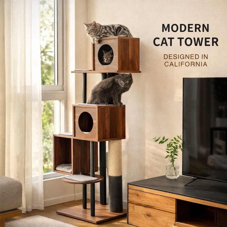 May include: A modern cat tower with multiple levels and wooden cubby houses. Three cats are perched on the tower. The text on the image reads "MODERN CAT TOWER DESIGNED IN CALIFORNIA."