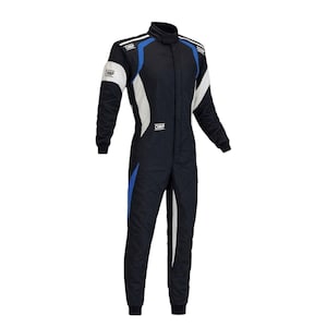 May include: A black racing suit with white and blue accents. The suit has a high collar, long sleeves, and a full-length zipper. The OMP logo is visible on the shoulders and chest. This racing suit is designed for motorsports.