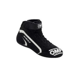 May include: A black high-top racing shoe featuring white OMP branding on the toe and ankle strap, with the word FIRST printed in white along the side. The shoe has a lace-up closure, a secure hook-and-loop ankle strap, and white accent lines.