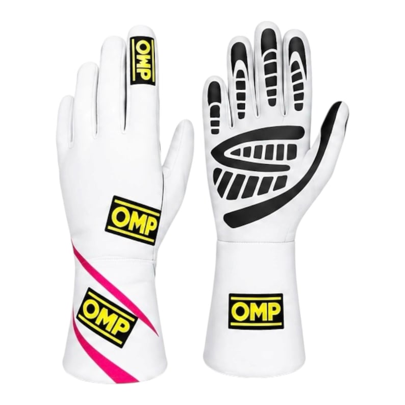 May include: A pair of white racing gloves featuring black grip patterns on the fingers and palm. The gloves display the yellow and black OMP logo on the index finger, wrist, and cuff, with a diagonal pink stripe accenting the lower wrist area.