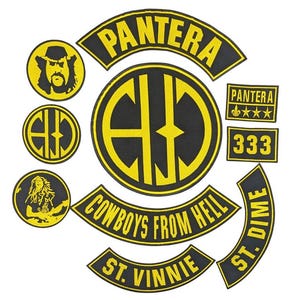 May include: A collection of black and yellow embroidered patches featuring the Pantera logo, the text Cowboys From Hell, St. Vinnie, St. Dime, 333, and illustrations of band members. The designs include circular, rectangular, and curved shapes.