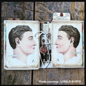 May include: Two vintage-style cards with illustrations of a man's profile on each side. The card on the left has the text "happy dreams come true" and the card on the right has the text "She was a believer".