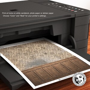 May include: A printable dollhouse wallpaper featuring a brown and beige floral pattern with a wood paneling border. The wallpaper is being printed on a black and white printer.