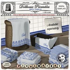 May include: Six miniature white bath towels with blue trim and the word "Bath" embroidered on them. The towels are stacked in a wicker basket and on a wooden surface. The image includes the text "Dollhouse Printables Bath Towels 1:12th scale".