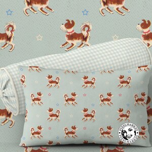 May include: A blue and white gingham pillow cover with a pattern of brown dogs on a light blue background. The pillow cover has a white border and a white zipper.