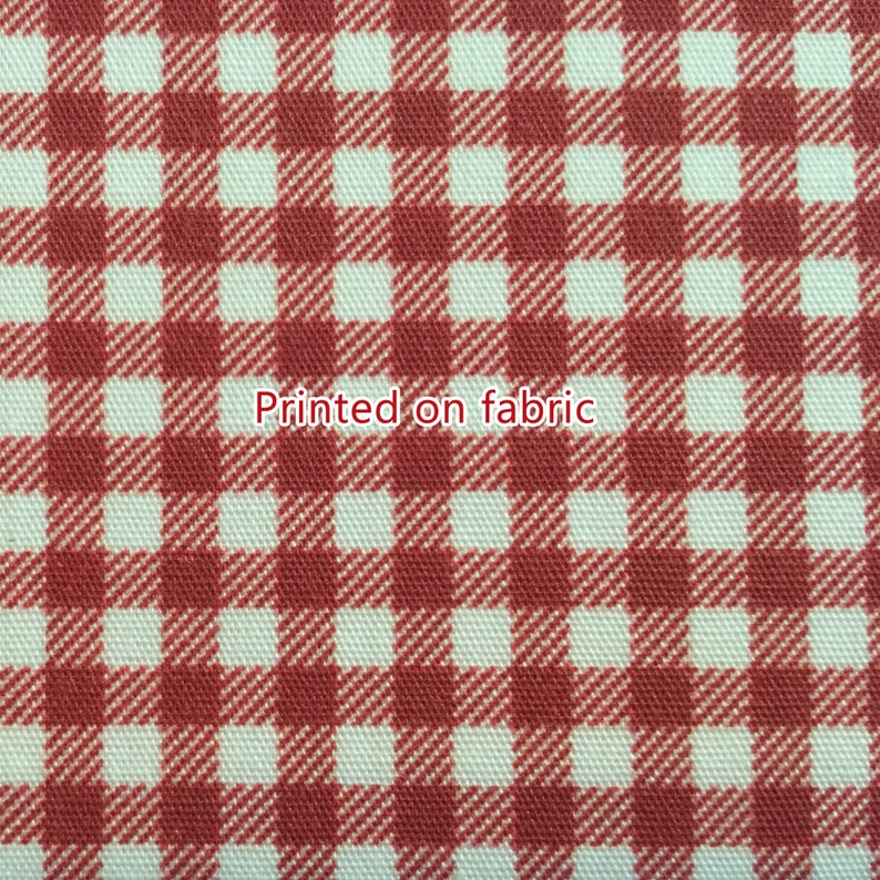 May include: Red and white gingham fabric with the text "Printed on fabric" in the center.