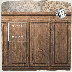 May include: A close-up of a wooden cabinet with three panels. The cabinet is painted a dark brown colour and has a distressed look. The panels are each 1 inch wide and 2.5 cm tall. The cabinet is topped with a decorative wallpaper border.