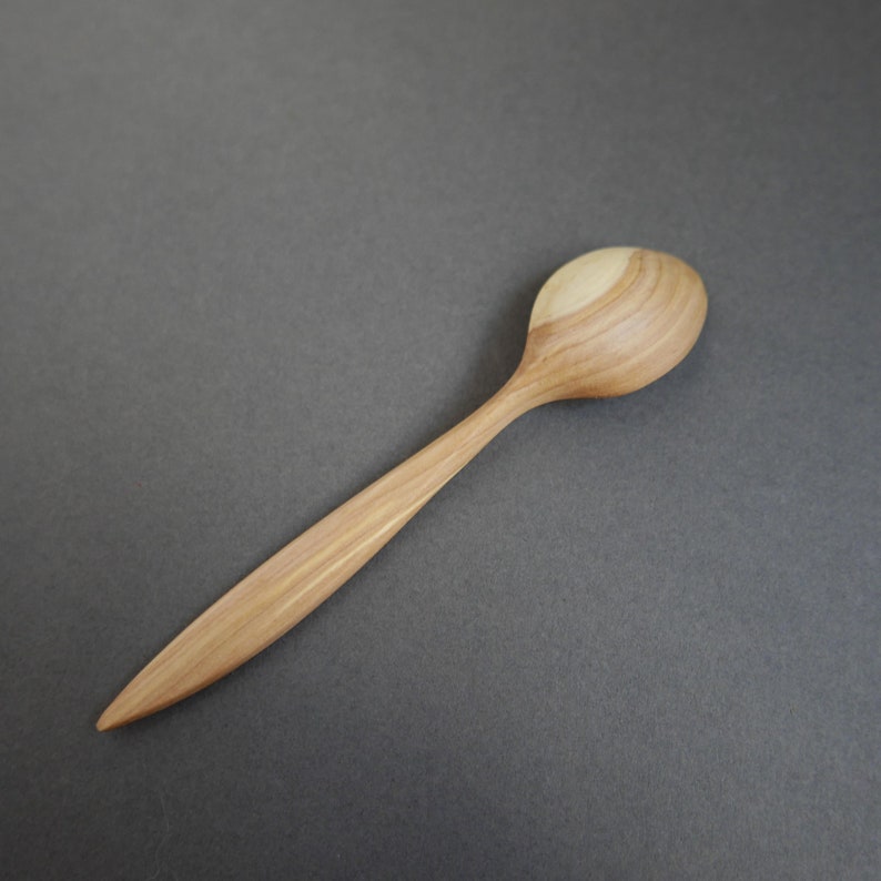 Wooden spoon hand carved of plum