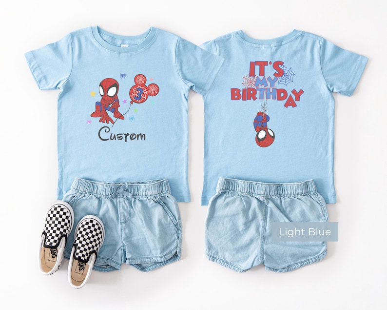 Light blue kids t-shirt with Spiderman birthday design, custom name and age print, “It’s My Birthday” back design, styled outfit with shorts and shoes