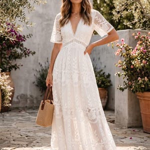 v neck embroidered maxi dress Black V-Neck Embroidered Top Maxi Dress with 3/4 Sleeves