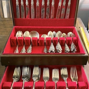 May include: A rustic wooden sign with the text "Welcome to our home" in white lettering. The sign features a distressed finish and a simple, inviting design, perfect for a front porch or entryway.