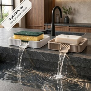 May include: Two rectangular soap and sponge holders with ribbed sides and integrated drainage spouts that channel water into a sink. One holder is white with a green and yellow sponge, the other is beige with a bar of soap. Digital STL file.