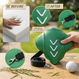 May include: A green golf swing training aid made of premium PU leather, featuring white arrow markings and a black strap with a silver clasp. The image also shows a white golf ball and a block of soft memory foam.