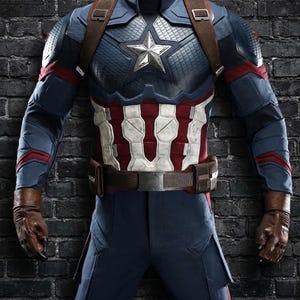 May include: A Captain America costume featuring a blue and red armored suit with a white and red striped midsection. The costume includes a silver star emblem, brown leather gloves, and a brown belt.