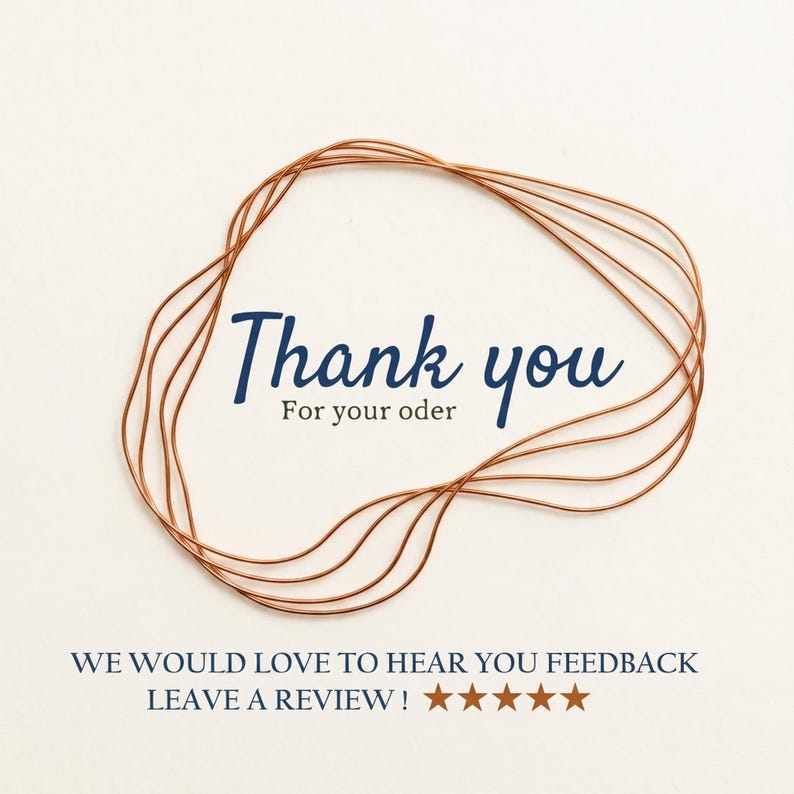 May include: A thank you card featuring a copper-colored wire frame design. The text reads Thank you For your oder in dark blue and black. Below, the text reads WE WOULD LOVE TO HEAR YOU FEEDBACK LEAVE A REVIEW ! with five orange stars.