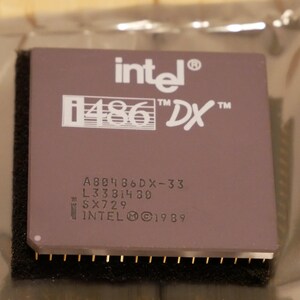 May include: A rustic wooden sign with the text "Welcome" in a handwritten style. The sign is painted white with a distressed finish, and a small, decorative heart is attached to the bottom. The background is a blurred image of a wooden surface.