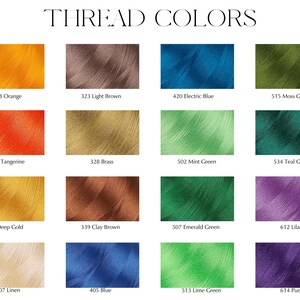 May include: A color chart displaying various thread colors. The chart includes swatches of orange, brown, blue, green, gold, and purple threads, each labeled with a number and color name. The text "THREAD COLORS" is at the top.