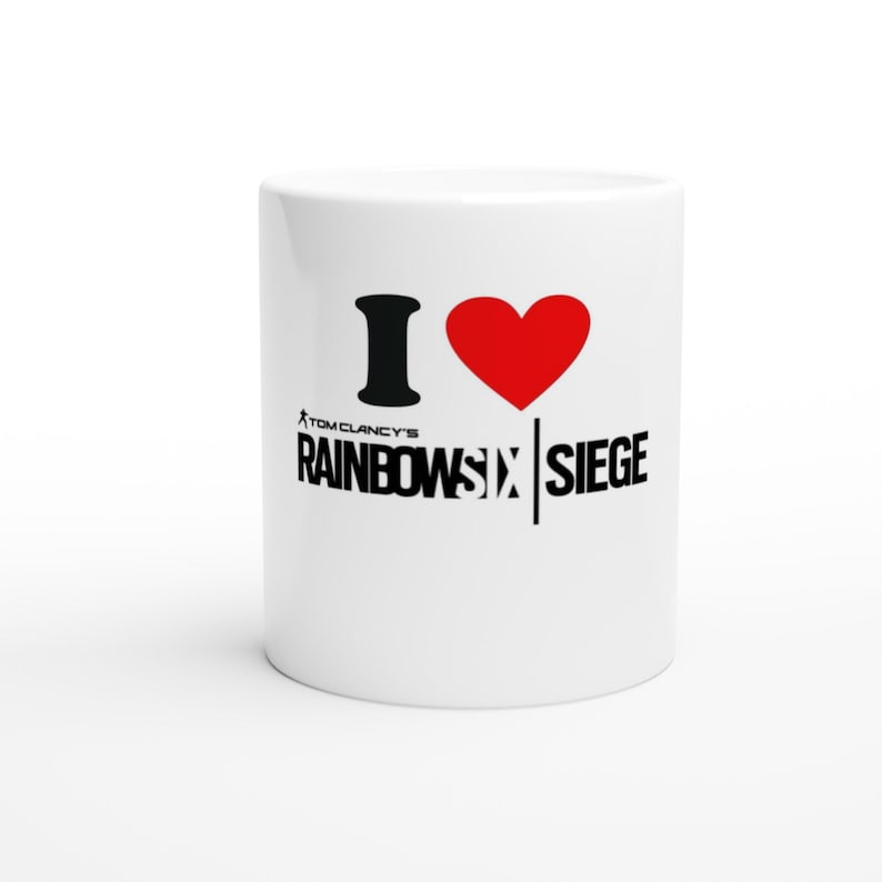 Taza de cerámica blanca de 325 ml con la frase "Me encanta Rainbow Six Siege" imagen 1
