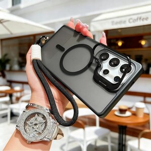May include: A clear phone case with a black frame and a black ring on the back. The case has a black lanyard attached with a white connector. The phone case is held by a person wearing a large, diamond-encrusted watch.