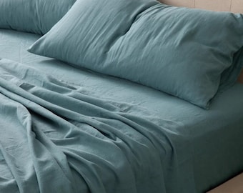 Jogo de lençóis em linho francês 100% na cor turquesa, castanho, macio e respirável.