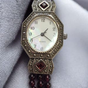 VTG 90s Avon Watch Stainless Steel and Garnet Mother Of Pearl Face New Battery image 1