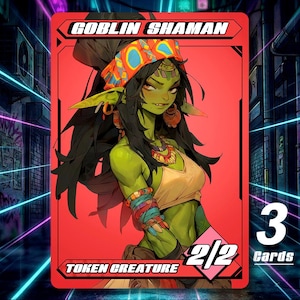 May include: A trading card featuring a green-skinned goblin shaman with long black hair and a colorful head wrap. The card has the text "Goblin Shaman" and "Token Creature" on a red background. The card also displays "2/2" and "3 Cards".