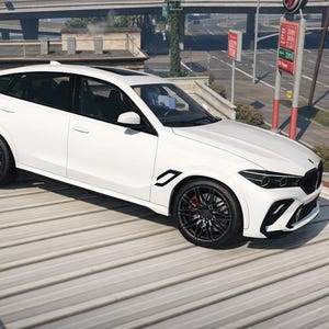 May include: A white coupe with black rims and tinted windows is parked on a gray surface. The car has a sleek design with black accents and a black front grill. The car is parked near a street.