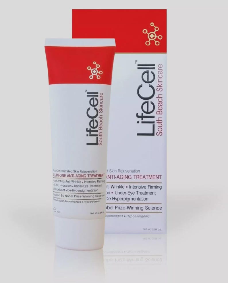 May include: A white tube of LifeCell anti-aging treatment with a red cap and accents, and a matching box. The tube and box feature the LifeCell logo and product information, including "South Beach Skincare."