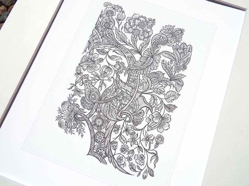 May include: Black and white floral illustration print. The artwork features intricate details of flowers, leaves, and swirling patterns. The print is framed in a white mat, creating a classic and elegant presentation. The overall design is detailed and ornate.