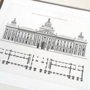 May include: Black and white architectural print of a building with a detailed facade and a floor plan below. The print is framed and features text in French.