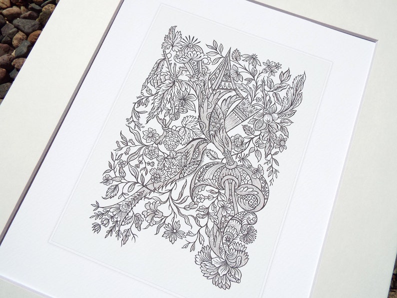 May include: Black and white floral illustration print, framed in a white mat. The detailed drawing features various flowers, leaves, and ornamental elements. The artwork is presented on a white background, creating a striking contrast.
