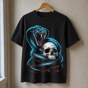 May include: A black short-sleeved t-shirt featuring a graphic print of a coiled snake with glowing blue scales, sharp fangs, and piercing red eyes wrapped around a detailed human skull with orange embers at the base of the design.