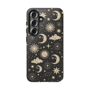 May include: Black phone case with a celestial design featuring moons, stars, suns, and clouds in a cream color. The case has a glossy finish and a camera cutout on the upper left side. The design is repeated across the entire surface of the case.