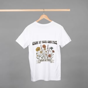 May include: A set of three ceramic mugs with a speckled, matte finish. The mugs are in shades of cream, light gray, and dark gray. Each mug has a simple, minimalist design, perfect for coffee or tea.