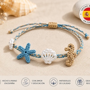 May include: A handmade macrame bracelet featuring a blue starfish, a white seashell, and a tan seahorse charm. The bracelet has blue and tan cord and is adjustable. The text "HECHO A MANO EN ESPAÑA" is visible.