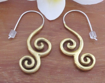May include: A pair of gold-toned earrings with a spiral design. The earrings have a simple hook closure.