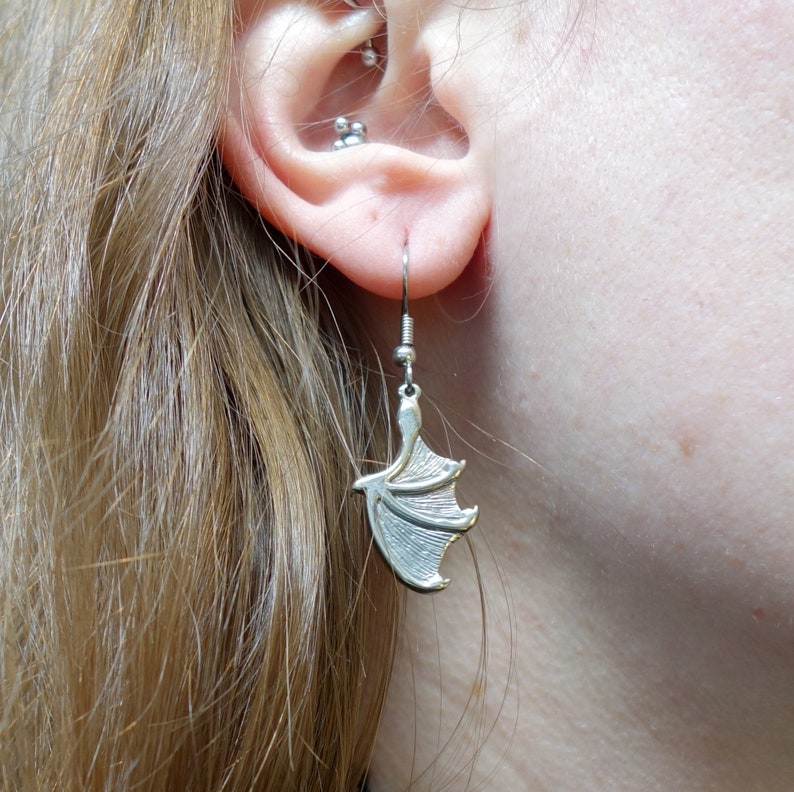 Bat Wing Earrings in White Brass ~ Silver-toned bat or dragon wings with surgical steel ear wires