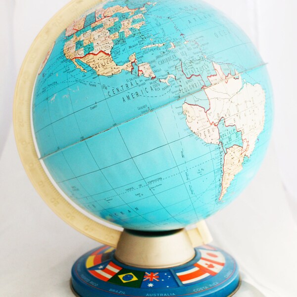 Globe - Metal tin colorful 12 inch Ohio Art Desktop globe with international flag base