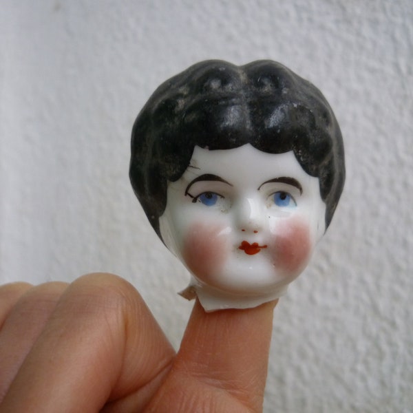 broken,glazed,Antique,China doll head,part,flawed,Thuringia,German doll fragment.
