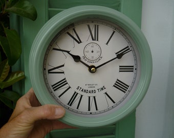shabby chic,green,small,round,tin metal,wall clock-battery operated.