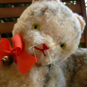 vintage,large,wood stuffed,plush,German cat,unjointed,reclining position,glass eyes.
