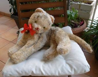 vintage,large,wood stuffed,plush,German cat,unjointed,reclining position,glass eyes.